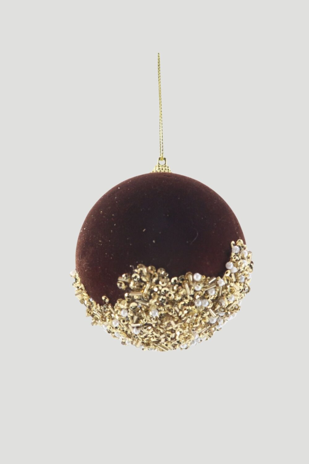 Dark brown velvet-look Christmas ball ornament with gold beading, pearl-like accents and a gold hanging cord.